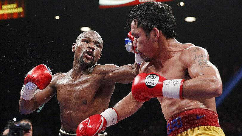 Wurde als "Jahrhundertkampf" angekündigt: Floyd Mayweather (l.) gegen Manny Pacquiao. Wurde als "Jahrhundertkampf" angekündigt: Floyd Mayweather (l.) gegen Manny Pacquiao.