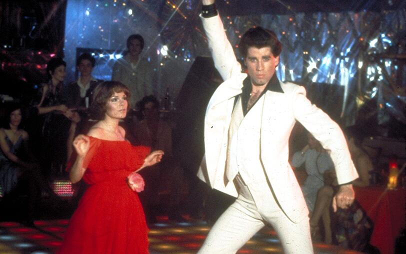 John Travolta (mit Karen Lynn Gorney) war die Rolle des Disco-Tanzgottes Tony wie auf den Leib geschneidert. John Travolta (mit Karen Lynn Gorney) war die Rolle des Disco-Tanzgottes Tony wie auf den Leib geschneidert.