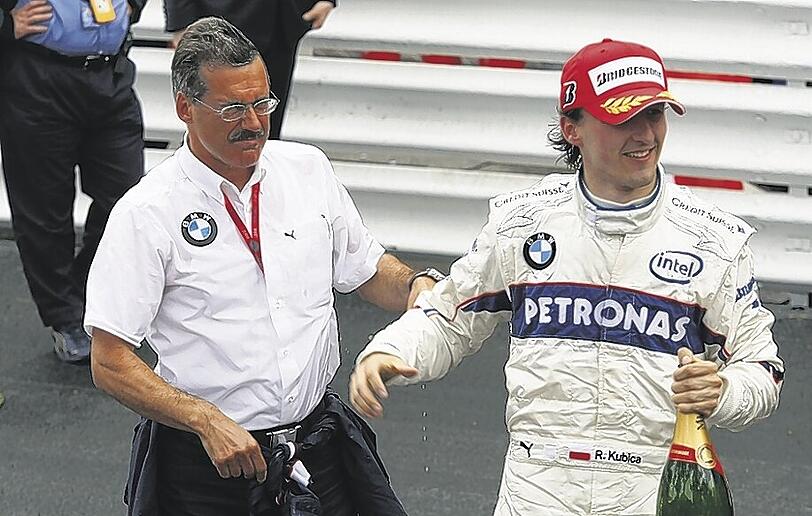 &bdquo;Wenn sich die Chance bietet, werden wir zuschlagen&ldquo;: BMW-Motorsportchef Theissen und sein Spitzenfahrer Kubica haben Geschmack am Erfolg (und am Sieger-Schampus) gefunden.