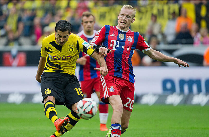 Werden in Zukunft gemeinsam den FC Bayern jagen: Neuzugang Sebastian Rode und Henrik Mkhitaryan