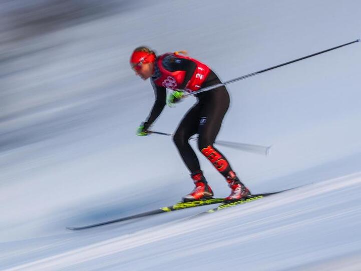 Die deutsche Langläuferin Nicole Fessel bei den Olympischen Winterspiele 2018 im Alpensia Langlaufzentrum. Foto: Daniel Karmann/Archivbild