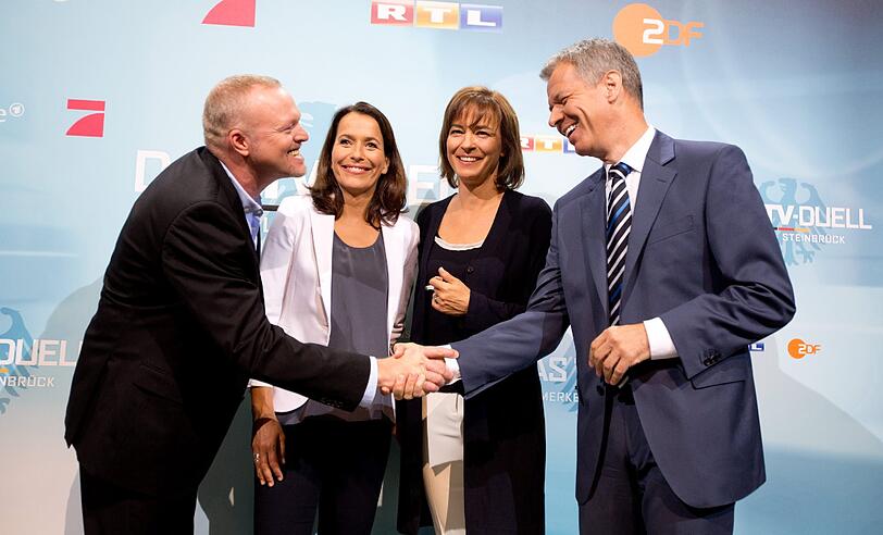 Die vier Moderatoren Stefan Raab, Anne Will, Maybrit Illner und Peter Kloeppel vor dem TV-Duell.