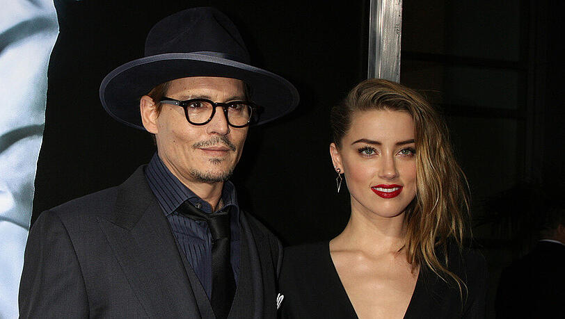 Damals schien ihre Welt noch perfekt: Amber Heard und Johnny Depp im Jahr 2014. Damals schien ihre Welt noch perfekt: Amber Heard und Johnny Depp im Jahr 2014.