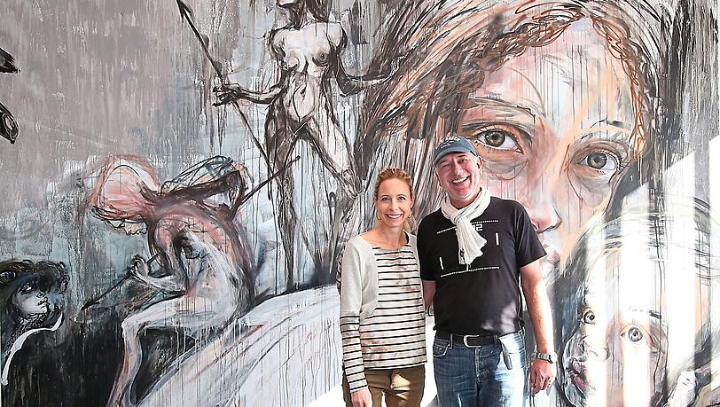 Die Organisatoren Stefanie Utz und Boris Schmidt vor dem Wandgemälde ihres Star-Duos Herakut. Die Organisatoren Stefanie Utz und Boris Schmidt vor dem Wandgemälde ihres Star-Duos Herakut.