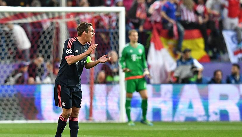 Philipp Lahm beim Hinspiel in Madrid, im Hintergrund Manuel Neuer. Philipp Lahm beim Hinspiel in Madrid, im Hintergrund Manuel Neuer.
