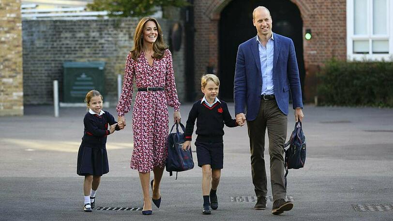 Prinz William (r.) und Herzogin Kate (2.v.l.) mit Prinz George und Prinzessin Charlotte.