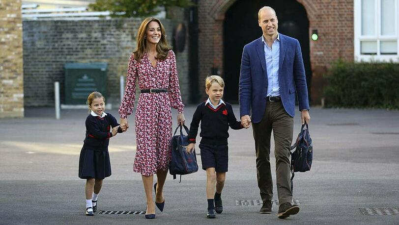 Prinz William (r.) und Herzogin Kate (2.v.l.) mit Prinz George und Prinzessin Charlotte. Prinz William (r.) und Herzogin Kate (2.v.l.) mit Prinz George und Prinzessin Charlotte.