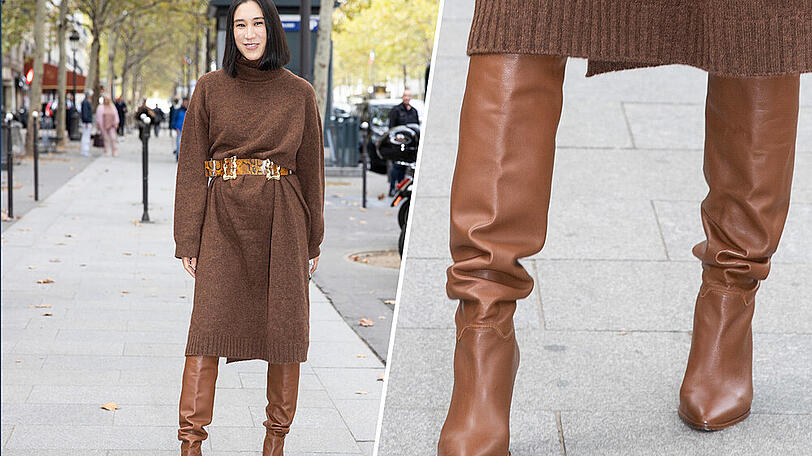 Instagram-Modechefin Eva Chen trägt den Herbsttrend Reiterstiefel zum taillierten Wollkleid.
