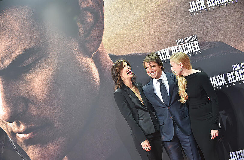 Cobie Smulders (l.), Tom Cruise und Danika Yarosh.
