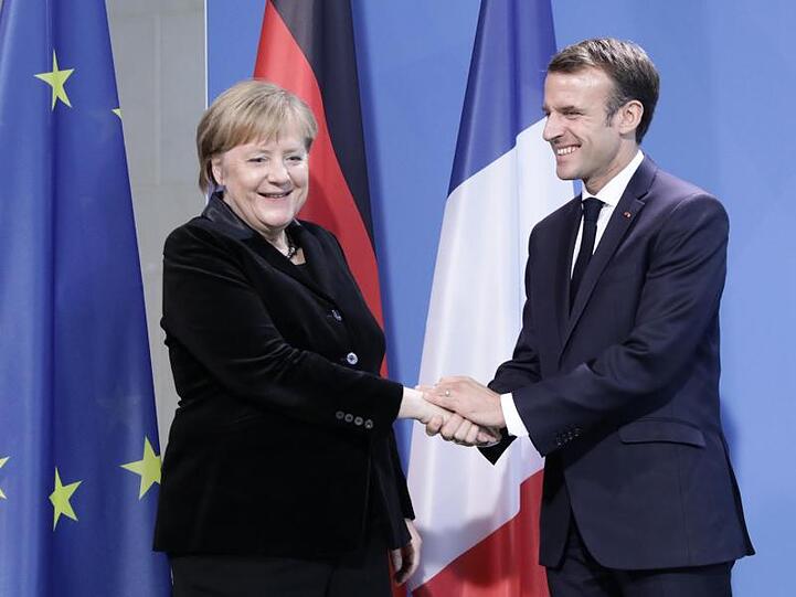 Angela Merkel (CDU) und Emmanuel Macron wollen in Aachen einen neuen Freundschaftspakt besiegeln.