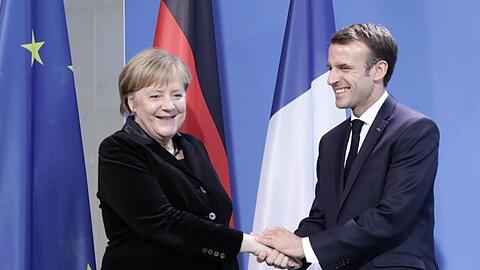 Angela Merkel (CDU) und Emmanuel Macron wollen in Aachen einen neuen Freundschaftspakt besiegeln.