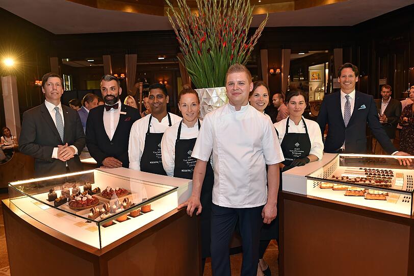 Ian Baker mit seinem Team