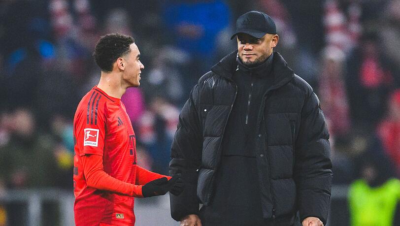 Bringt Trainer Vincent Kompany (r) Jungstar Jamal Musiala in Rotterdam wieder von Anfang an? (Symbolbild). Bringt Trainer Vincent Kompany (r) Jungstar Jamal Musiala in Rotterdam wieder von Anfang an? (Symbolbild).