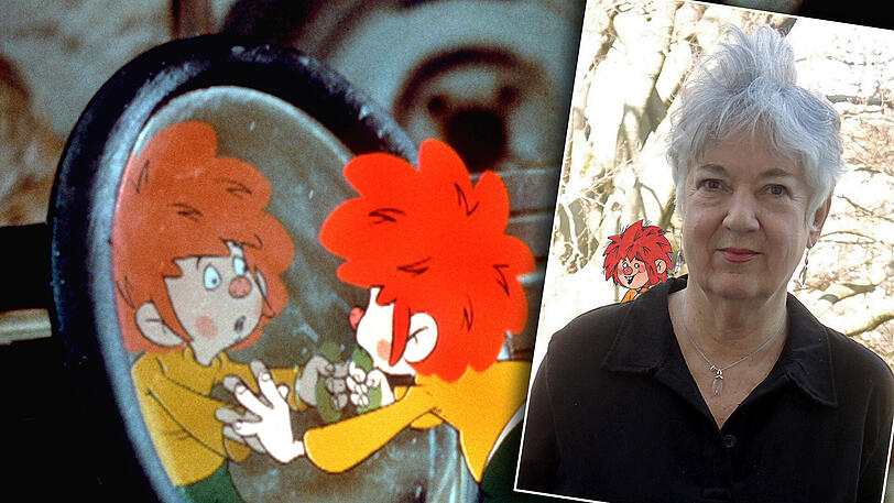 Barbara von Johnson, die Zeichnerin des "Pumuckl" mit einer montierten Grafik des Kobolds auf der Schulter.