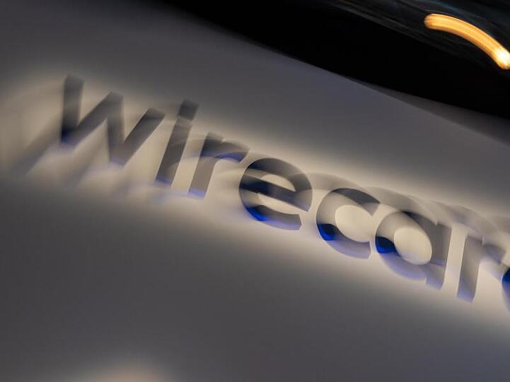 Blick auf das Wirecard Logo. Foto: Peter Kneffel/dpa/Archivbild
