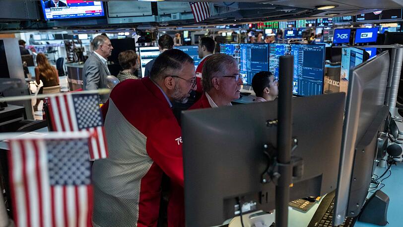 Händler an der Wall Street: In den USA steigen die Renditen von Staatsanleihen immer mehr an.(Archivbild) Händler an der Wall Street: In den USA steigen die Renditen von Staatsanleihen immer mehr an.(Archivbild)