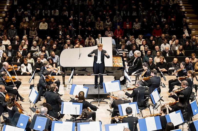 Der Dirigent Philippe Jordan und der Pianist François-Frédéric Guy mit den Münchner Philharmonikern.