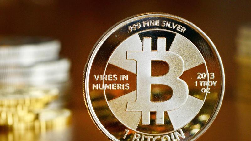 Das Bitcoin-Logo auf einer Münze. Das Bitcoin-Logo auf einer Münze.
