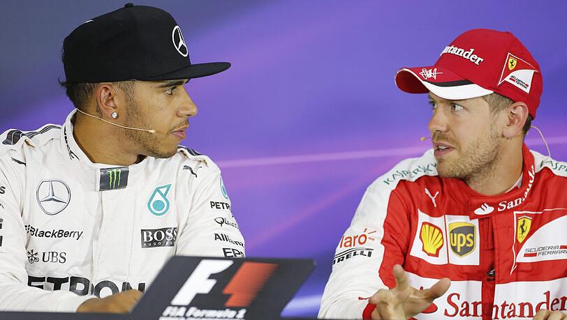 Nach Vettels Rüpel-Rempler gegen Hamilton (links) herrscht erst einmal Eiszeit zwischen den Titelkandidaten. Nach Vettels Rüpel-Rempler gegen Hamilton (links) herrscht erst einmal Eiszeit zwischen den Titelkandidaten.