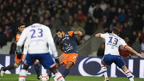Younes Belhanda (Mitte) im Trikot von HSC Montpellier.