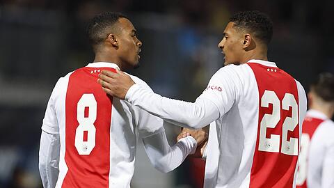 Ryan Gravenberch (l.) und Sébastien Haller spielten gemeinsam bei Ajax Amsterdam.