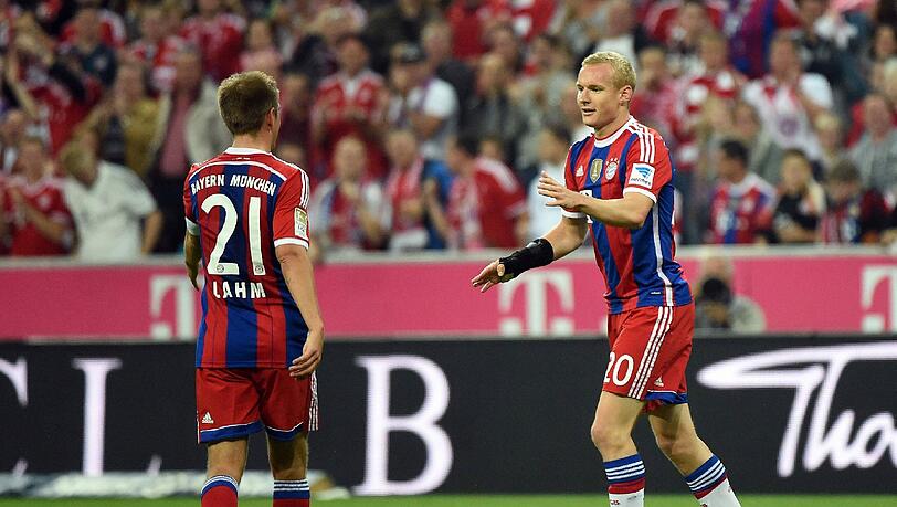 Für eine Vereinfachung der momentan recht komplizierten Handspiel-Regelung: Die Bayern-Stars Philipp Lahm und Sebastian Rode. Für eine Vereinfachung der momentan recht komplizierten Handspiel-Regelung: Die Bayern-Stars Philipp Lahm und Sebastian Rode.