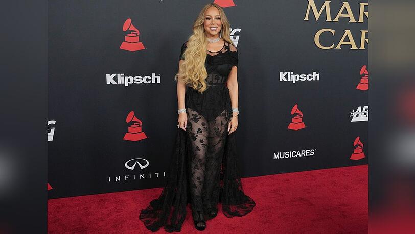 Mariah Carey auf dem roten Teppich bei der MusiCares-Gala. Mariah Carey auf dem roten Teppich bei der MusiCares-Gala.