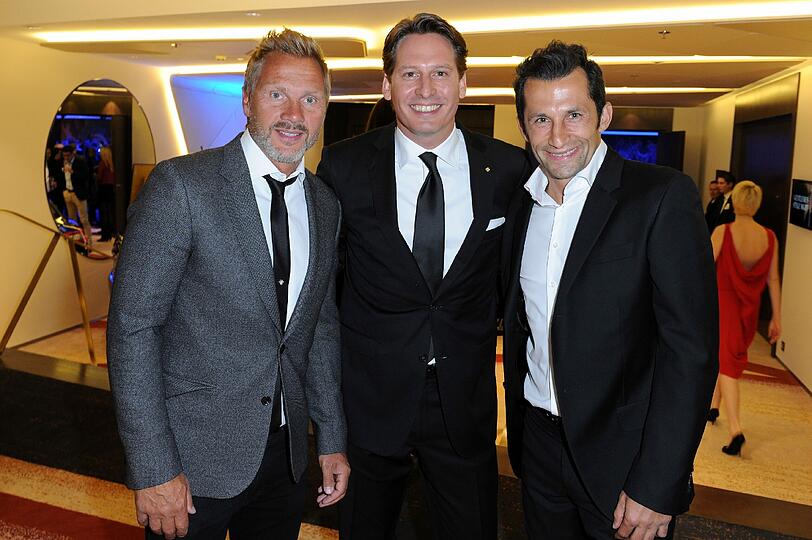 Thorsten Fink, Vier Jahreszeiten Managing Director Axel Ludwig und Hasan Salihamidzic bei der GENTLEMEN STYLE NIGHT im Hotel Vier Jahreszeiten.