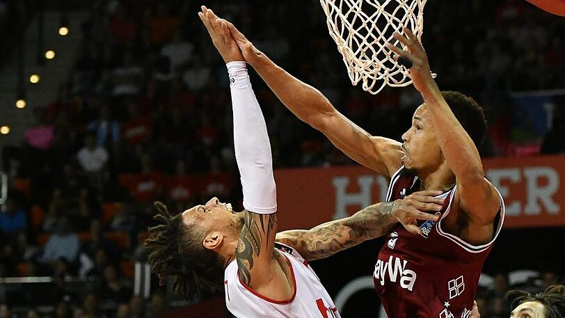 "Wir waren über 40 Minuten offensiv wie defensiv voll konzentriert", sagt Dejan Radonjic (kleines Foto) nach dem klaren 99:67 seiner Bayern über Bamberg.