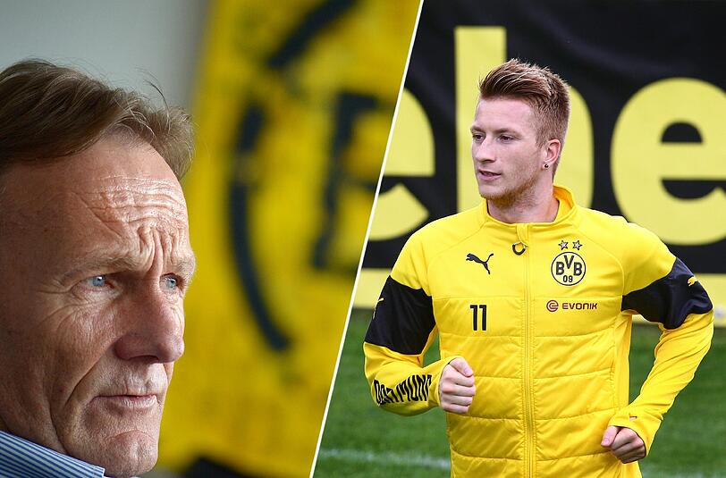 Dortmund-Boss Hans-Joachim Watzke will Marco Reus (r.) beim BVB halten.
