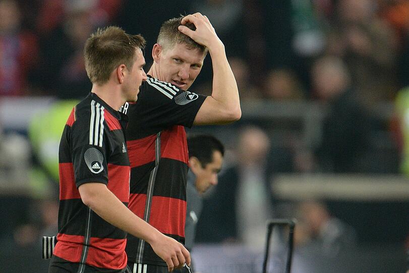 Philipp Lahm (l.) und Bastian Schweinsteiger im Trikot der Nationalmannschaft.