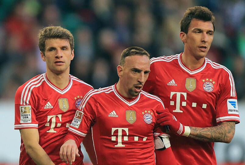 Thomas Müller, Franck Ribéry und Mario Mandzukic (von links) in der Saison 2014/2015.
