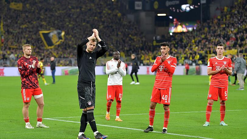 So richtig konnten sich Bayern-Kapitän Manuel Neuer und seine Kollegen nicht über den Punkt in Dortmund freuen.