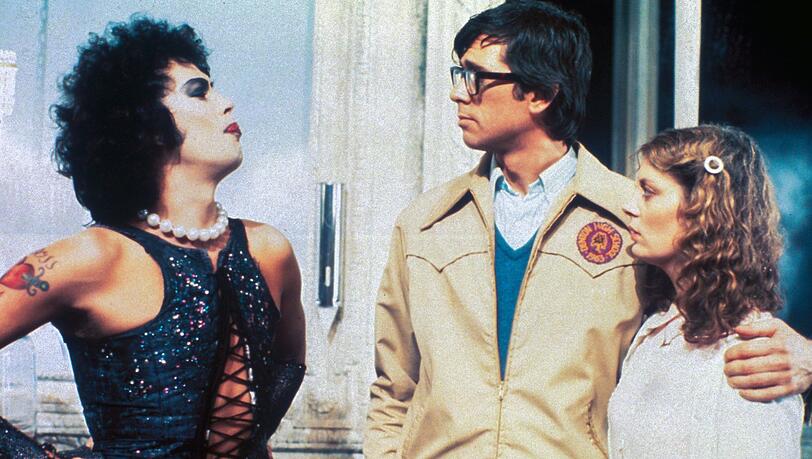 Das junge Liebespaar Brad (Barry Bostwick, Mitte) und Janet (Susan Sarandon) flüchten sich während eines Unwetters ins Anwesen des exzentrischen Doktors (Tim Curry). Das junge Liebespaar Brad (Barry Bostwick, Mitte) und Janet (Susan Sarandon) flüchten sich während eines Unwetters ins Anwesen des exzentrischen Doktors (Tim Curry).