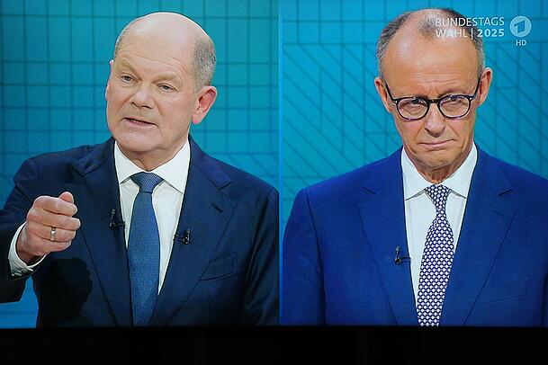 Kanzler Scholz und sein Herausforderer Merz.