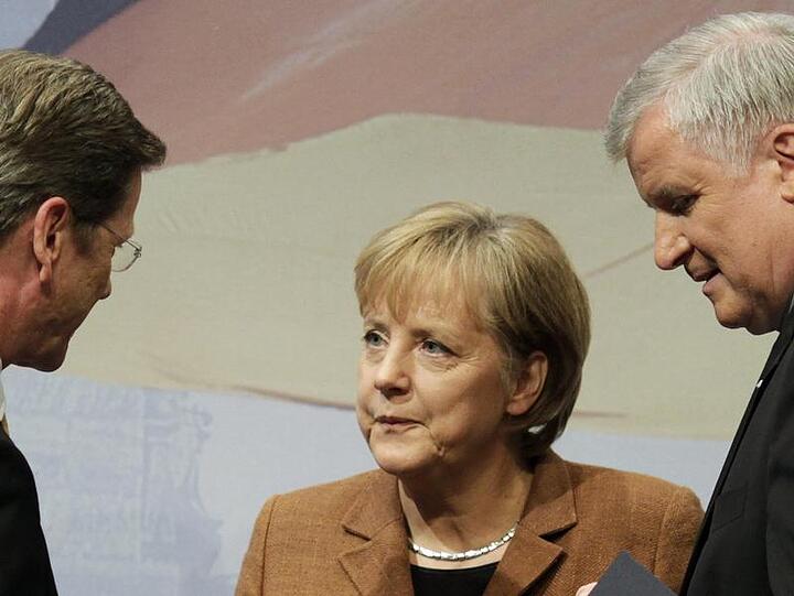 Westerwelle, Merkel und Seehofer
