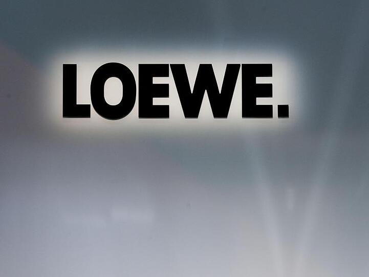 Logo des TV-Herstellers Loewe. Foto: Robert Schlesinger/Archivbild