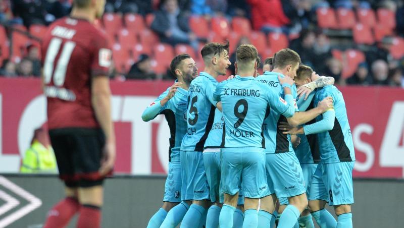Die Freiburger Spieler jubeln über das Tor zum 1:0 beim FC Nürnberg. Die Freiburger Spieler jubeln über das Tor zum 1:0 beim FC Nürnberg.