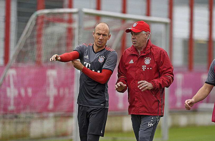 Arjen Robben (l.) und Carlo Ancelotti.