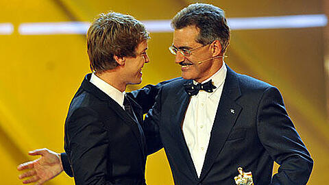 Vettel und Mario Theissen (r.).