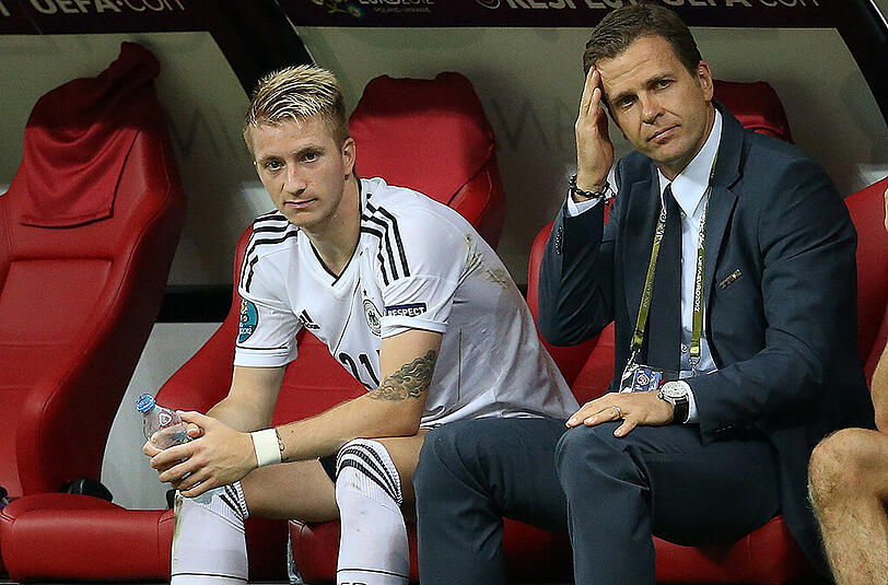 Würde er Dortmunds Topstar Marco Reus (l.) am liebsten noch länger beim BVB sehen? DFB-Teammanager Oliver Bierhoff (r.)