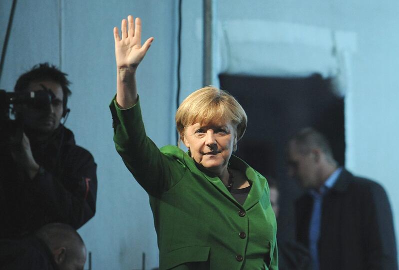 Angela Merkel und Horst Seehofer werben am Freitagabend auf dem Münchner Odeonsplatz um Stimmen für die Bundestagswahl am Sonntag.