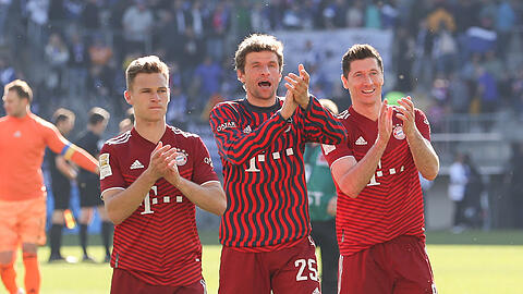 Sie alle wollen bereits am kommenden Wochenende Meister werden: Die Bayern-Stars Joshua Kimmich, Thomas Müller und Robert Lewandowski (v.l.).