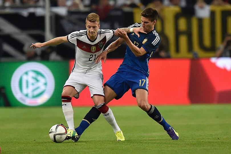 MARCO REUS - NOTE 3 - Ihm müssen die WM-Ehrungen am meisten weh getan haben: Am Tag vor dem Abflug verletzte sich der BVB-Star schwer. Bei der Final-Revanche hatte er die meisten Dribblings(-versuche). Bei seiner Aktion in Minute 37 fehlte Glück, ein argentinisches Bein rettete.