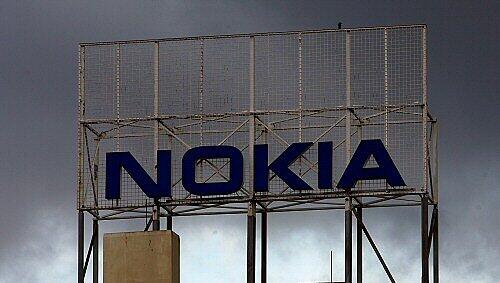 Mitarbeiter dieses Nokia-Werkes planen eine Menschenkette Mitarbeiter dieses Nokia-Werkes planen eine Menschenkette