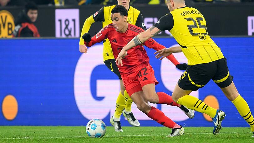 Maximilian Beier, Jamal Musiala und Niklas Süle (v.l.) in der Partie Borussia Dortmund gegen FC Bayern München.