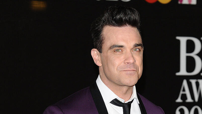Robbie Williams kehrt nach zwei Wochen Quarantäne endlich zu seiner Familie zurück Robbie Williams kehrt nach zwei Wochen Quarantäne endlich zu seiner Familie zurück