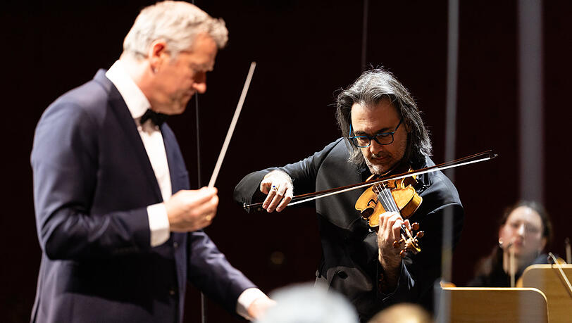 Der Dirigent Markus Poschner mit dem Geiger Leonidas Kavakos im Nationaltheater.